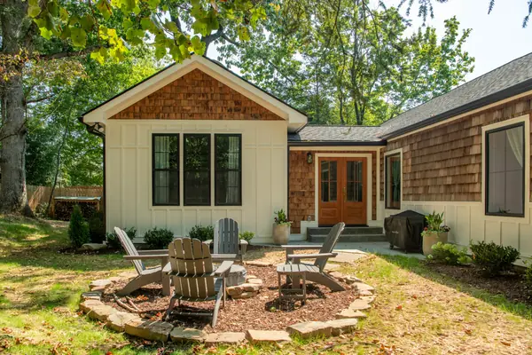 Rear elevation of the addition with double doors opening onto the patio