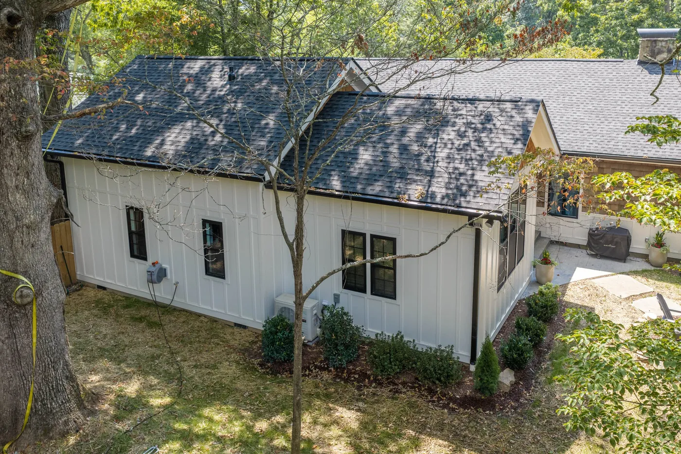 Roofline and board-and-batten siding of a completed home addition built by Riverside Construction Services in the Chattanooga area