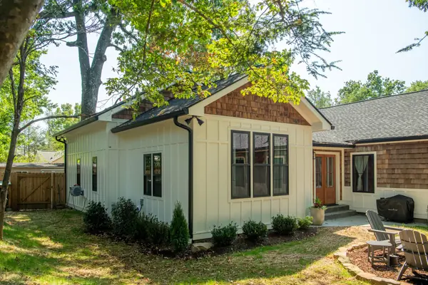 Side elevation showing the cedar shake gable end of the addition