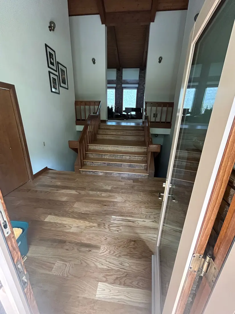 Interior entry with refinished hardwood