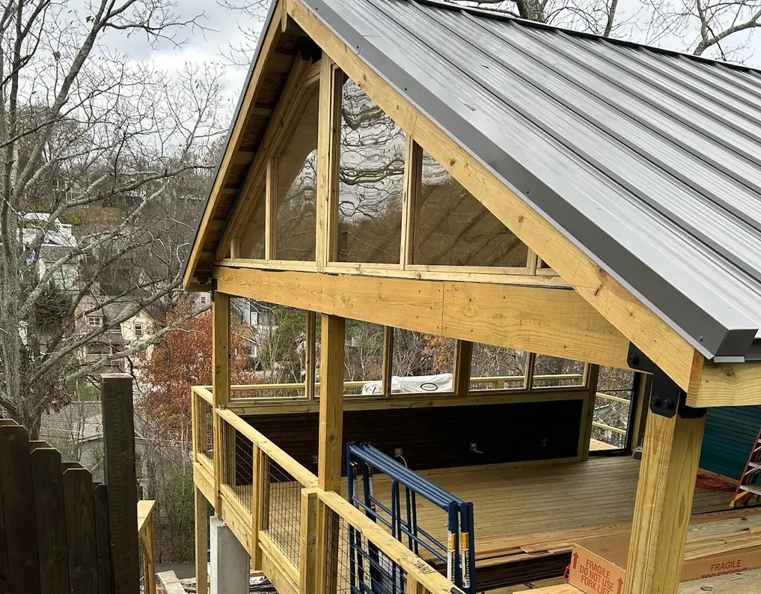 Timber-framed covered porch built by Riverside Construction Services
