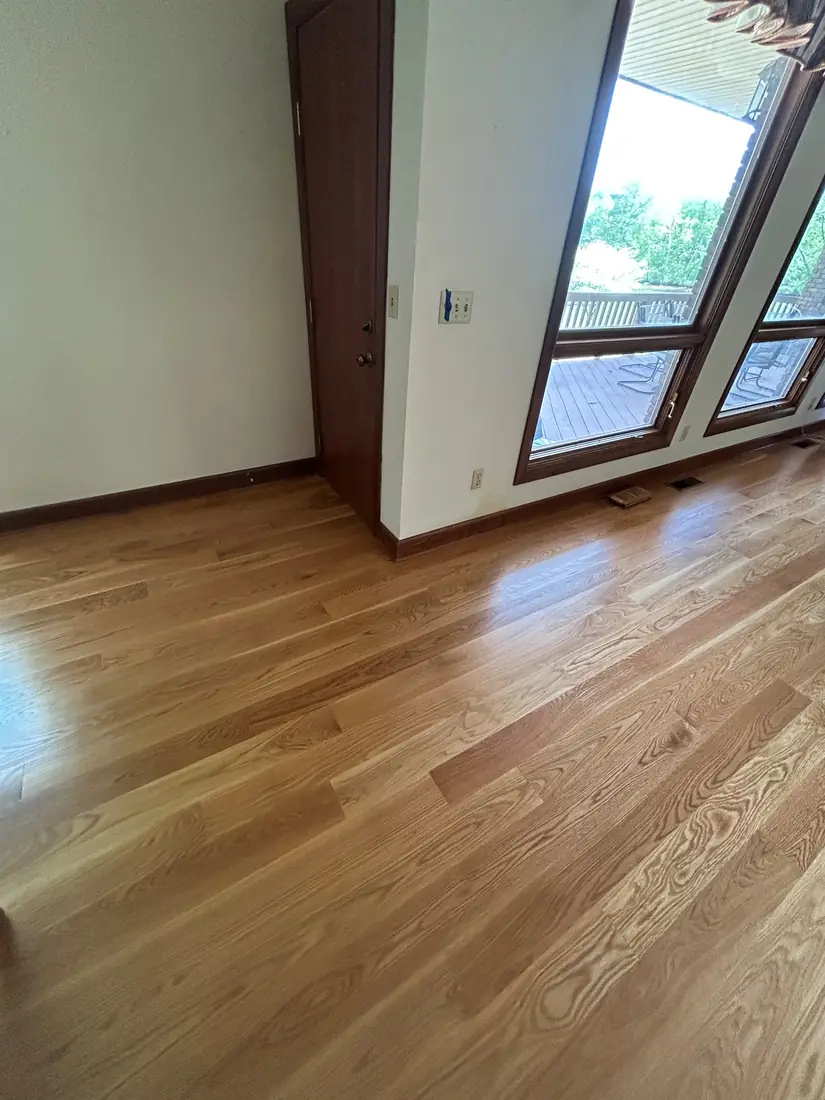 Room with refinished hardwood floors