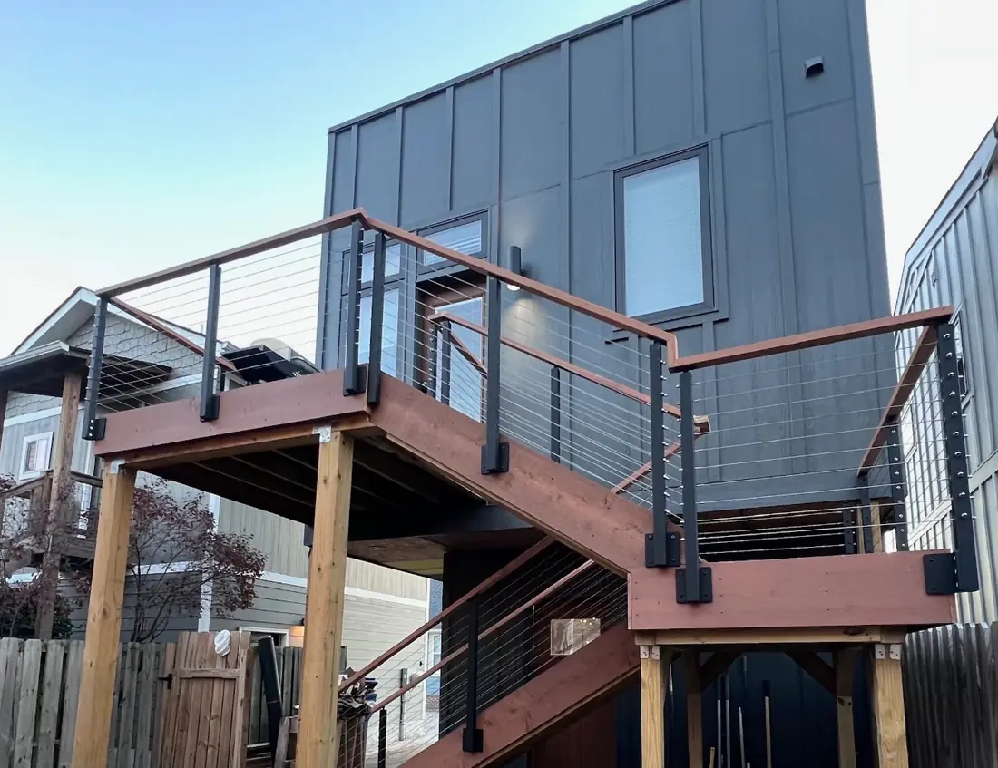 Multi-level deck and stair system with cable railing