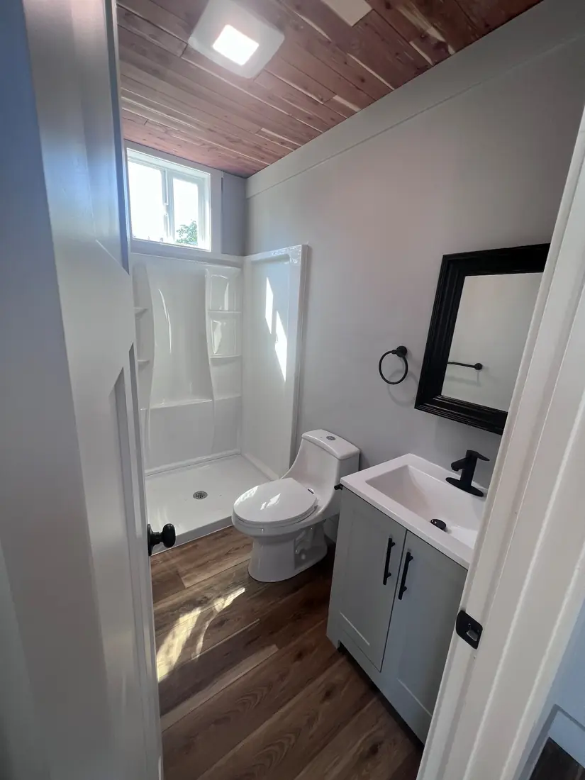 Tiny home bathroom with cedar ceiling