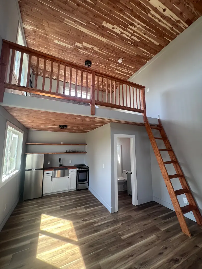 Tiny home interior with sleeping loft